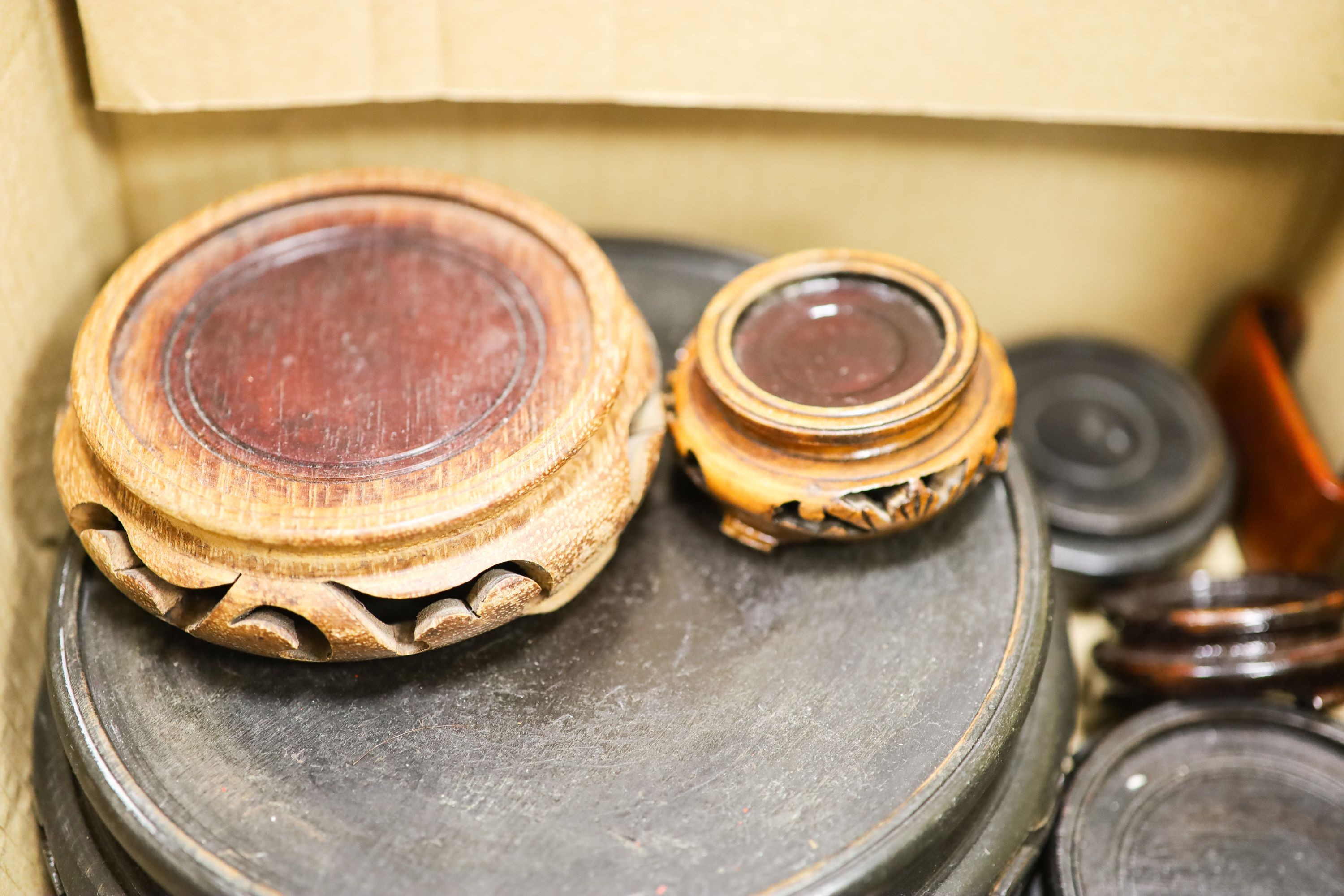 Assembled Chinese wooden stands and simulated cinnabar dish with sign